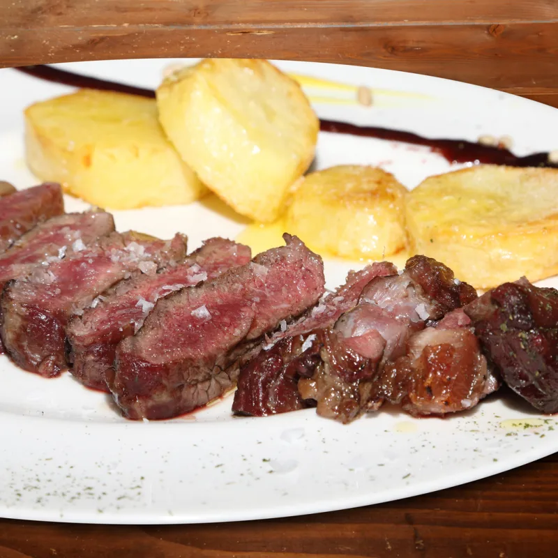Plato de la carta de Tinto y Leña